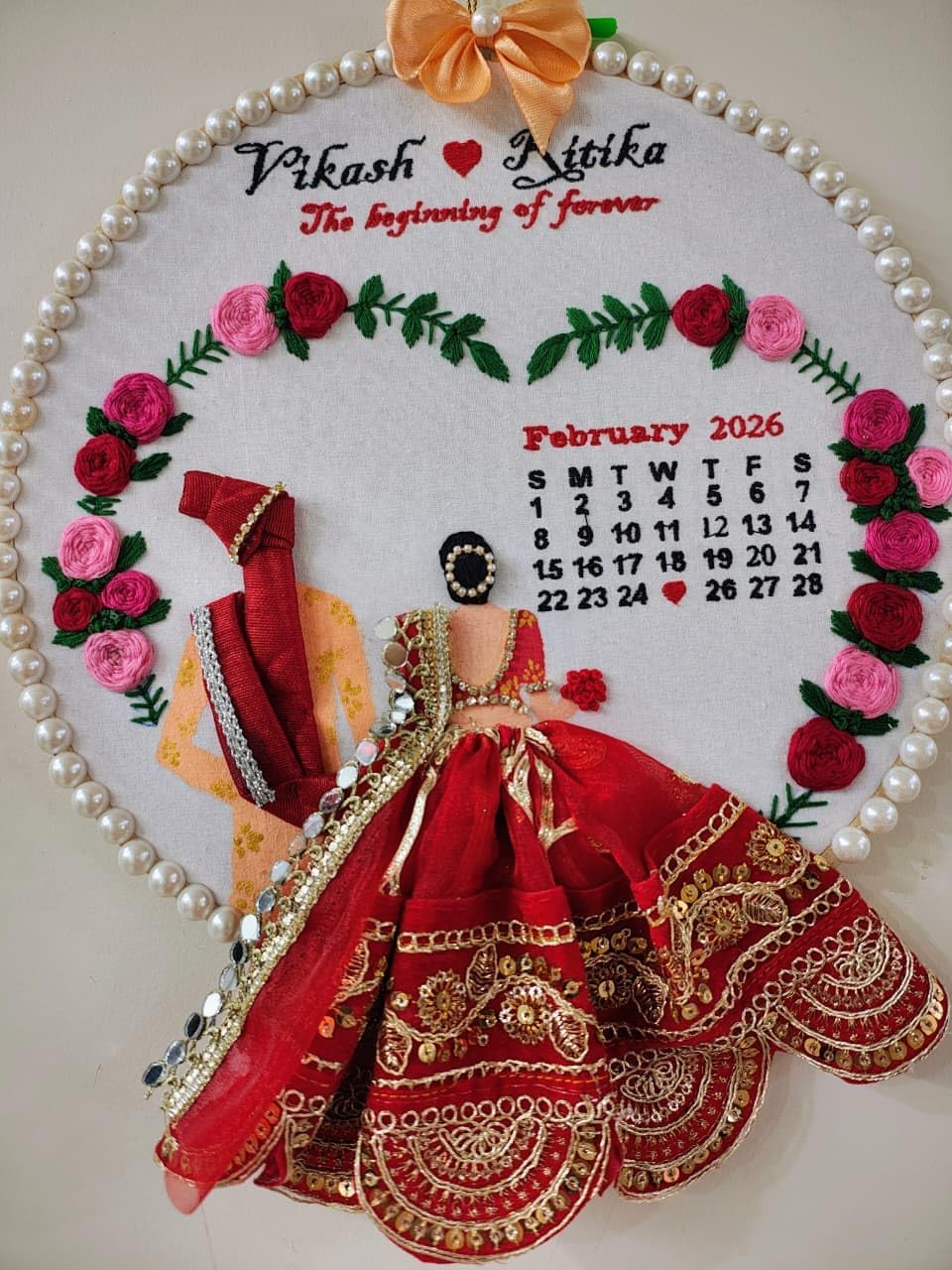 INFINITY CREATIONS Customized Wedding Embroidery Hoop Frame | Handcrafted Hoop with Floral Design, Pearl Border & Calendar Display | Personalized Couple Names | Marriage, Anniversary Gifts | Red and Pink Theme Keepsake Gift (10 Inch)